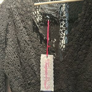 Brand Temptation Positano.  Size Large. Color black.  New with tags